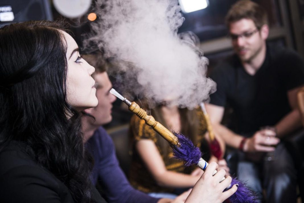 woman-smoking-hookah-and-wondering-is-hookah-bad-for-you